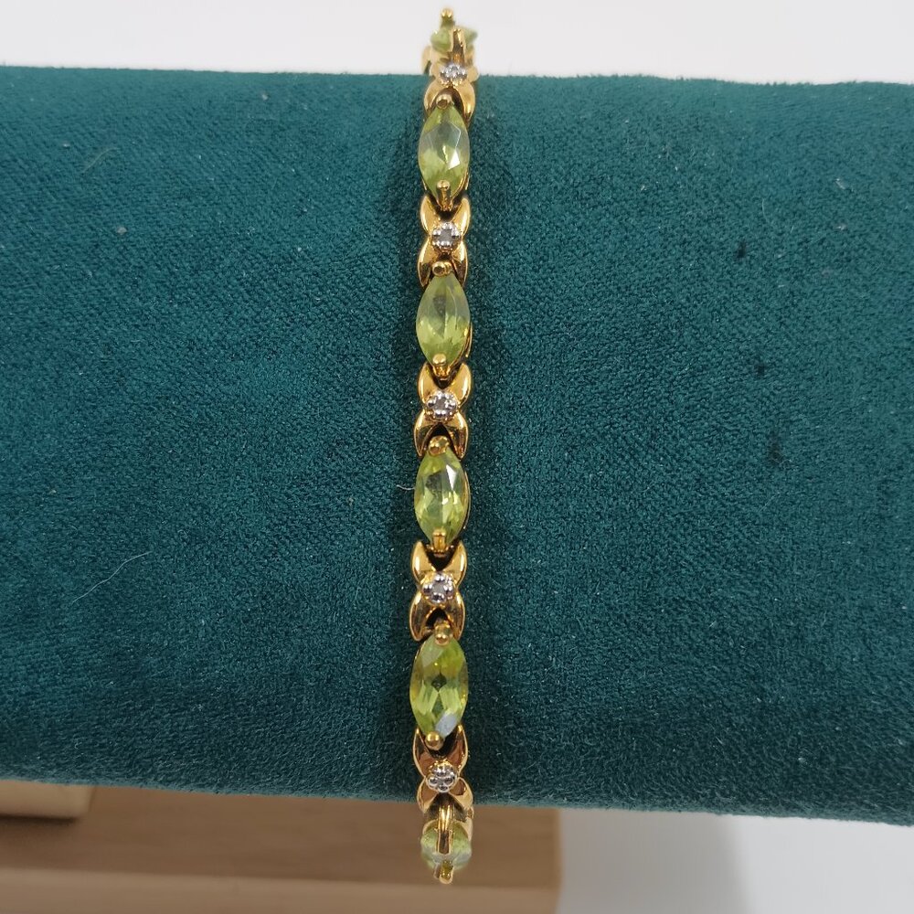 Beautiful Sterling Silver Marquise cut Peridot and Diamond chip 14K Bracelet.